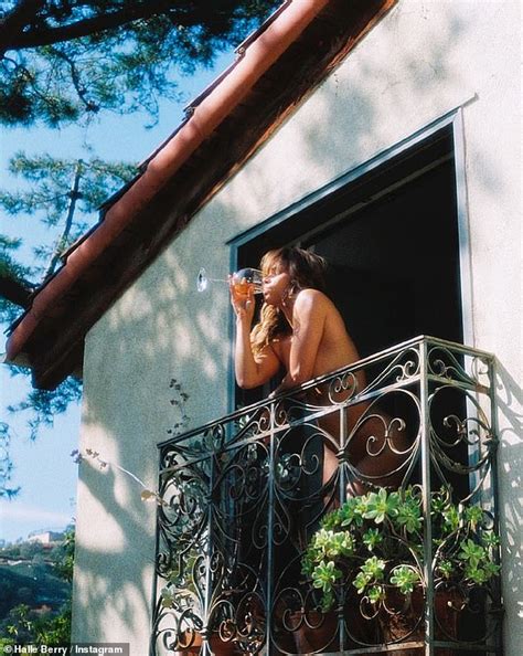 halle berry enjoyed a glass of wine in the nude.|Halle Berry Drinking Wine While Naked on Her Balcony Is a